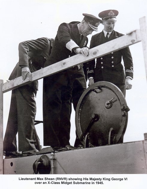 Lieutenant Max Shean DSO*, US Bronze Star showing an X-Craft to King George VI